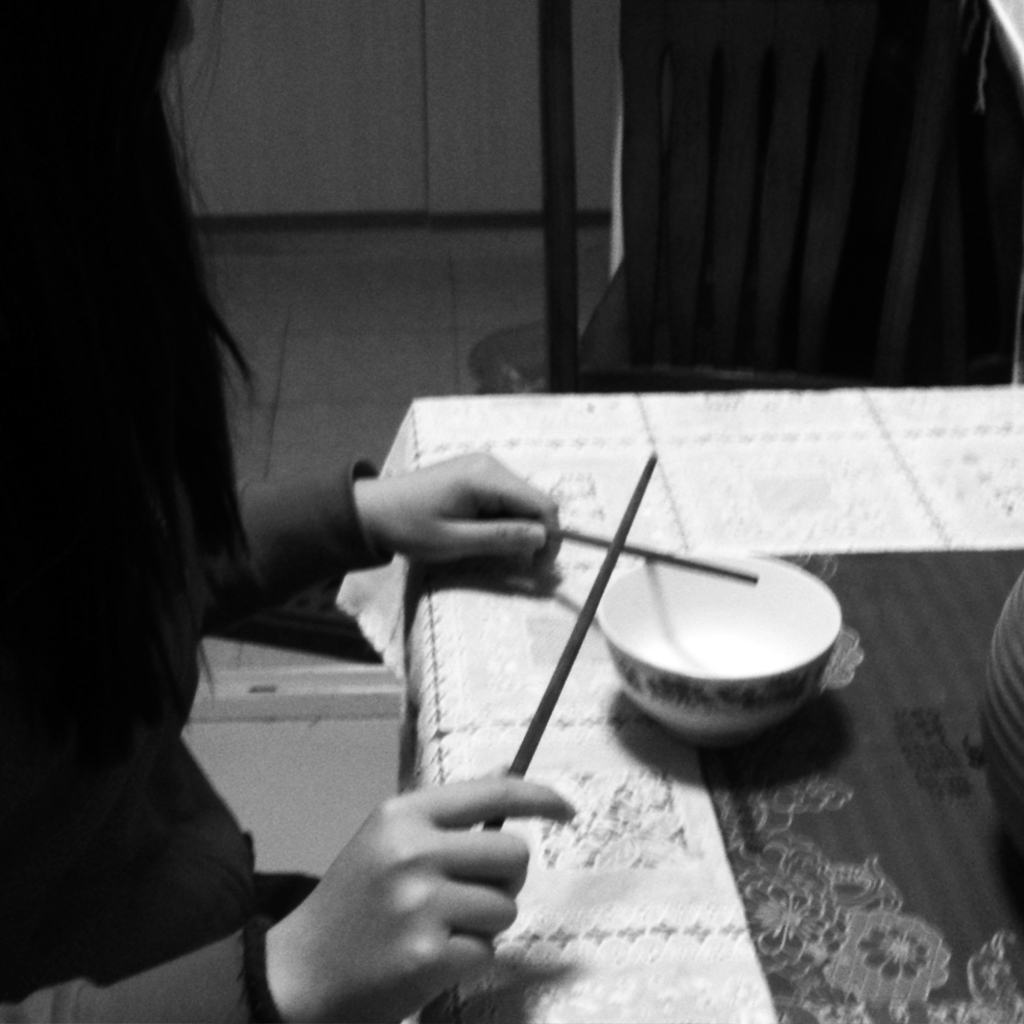playing with chop sticks